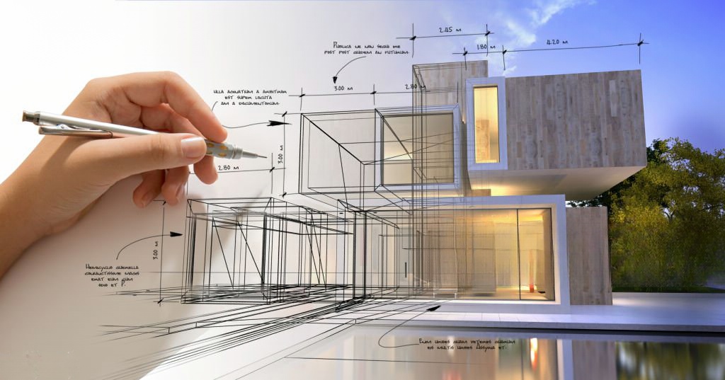Mão a desenhar um projecto a simbolizar o licenciamento urbanístico